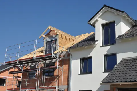 house under construction with openings